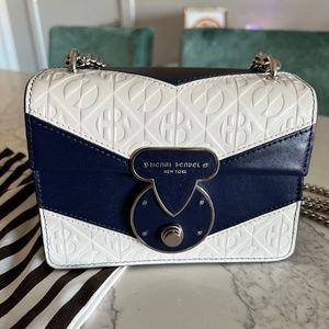 Henri Bendel Cross/Shoulder Bag. Good for Party and Causal
